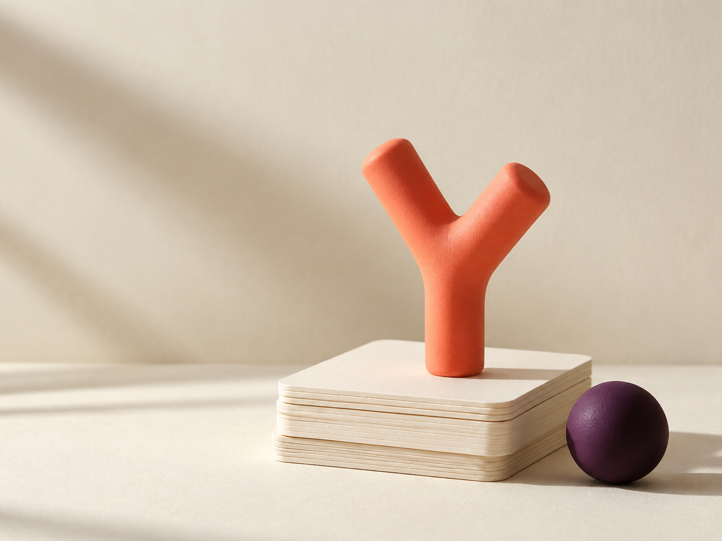 A coral branching sculpture on blank study cards, a reminder to pause and choose.